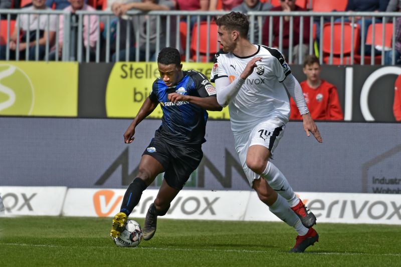 Abwehrspieler Kister (re.) und Duell mit Paderborns Antwi-Adjei