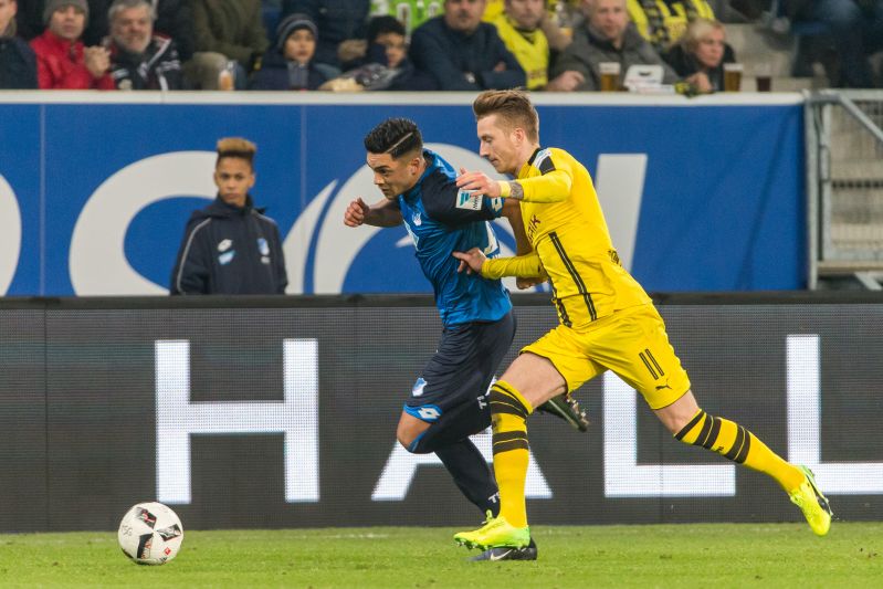 Hoffenheims Amiri (li.) im Laufduell mit Dortmunds Reus